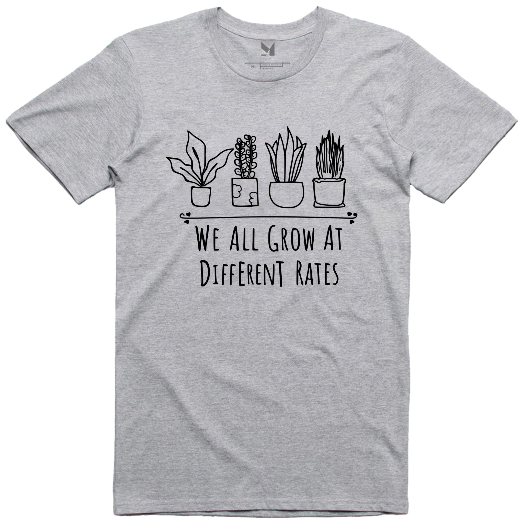 WE ALL GROW AT DIFFERENT RATES TSHIRT