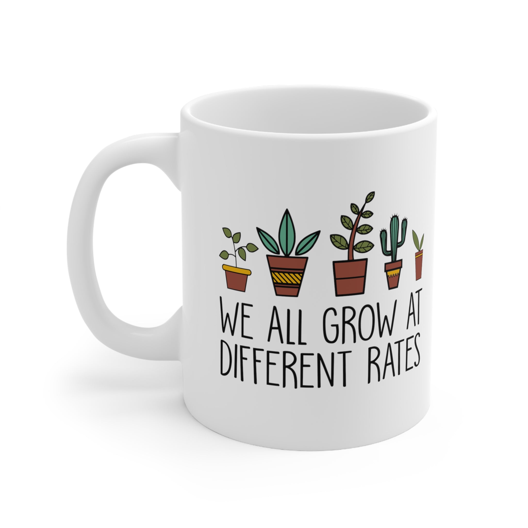 WE ALL GROW AT DIFFERENT RATES MUG