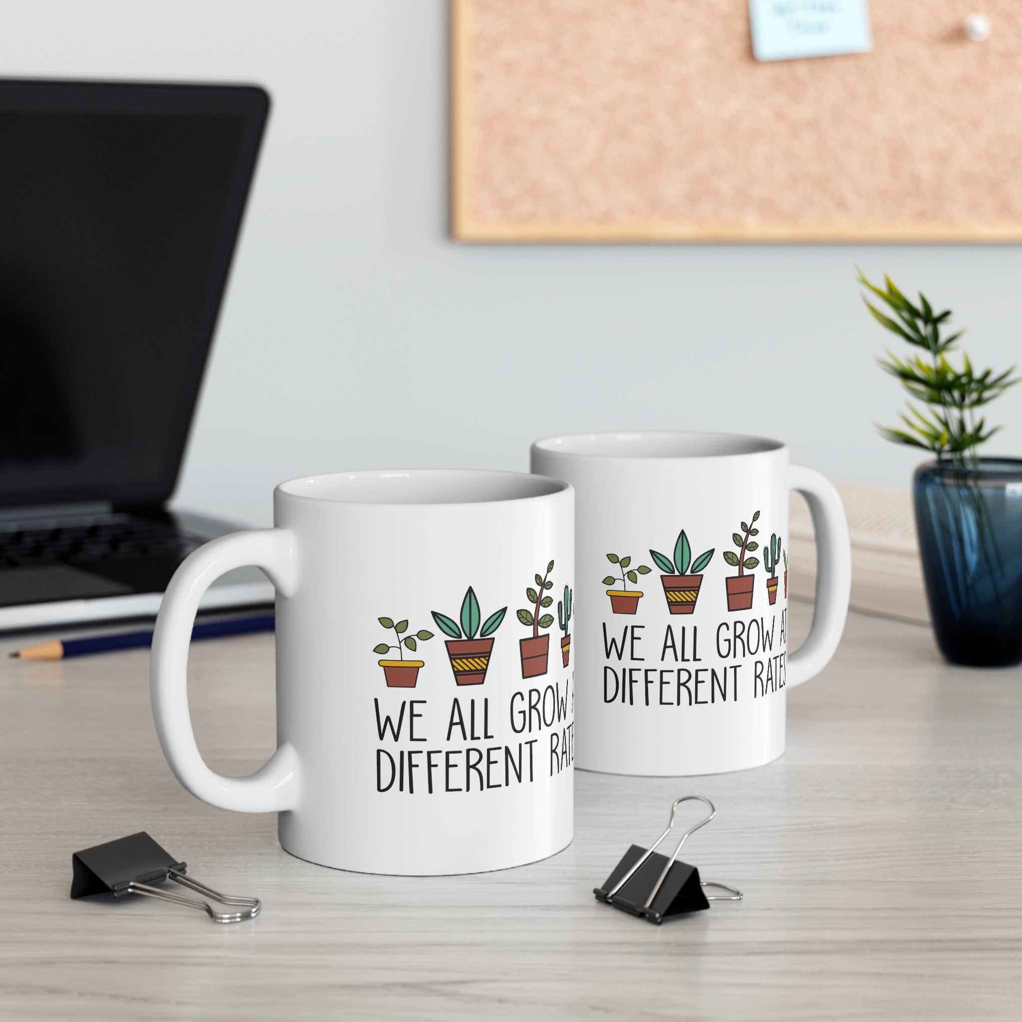 WE ALL GROW AT DIFFERENT RATES MUG